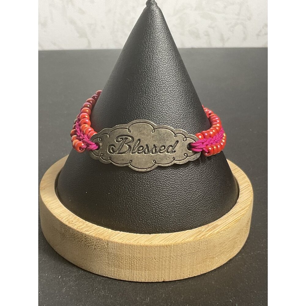 Blessed Bracelet With Red Beads On Pink Cord